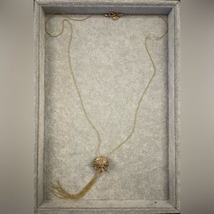 Elegant Gold Coloured Long Necklace with Round Ball / Floral Pendant with Tassel